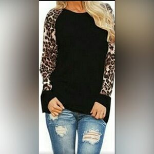 NWOT Black leopard sleeve top, size large.